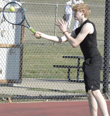 NOAH DUNKER, shown keeping his eyes on the ball while attempting a forehand shot, is expected by coach Richie Marsh to be a team leader for Excelsior Springs in varsity boys tennis. SHAWN RONEY | Staff