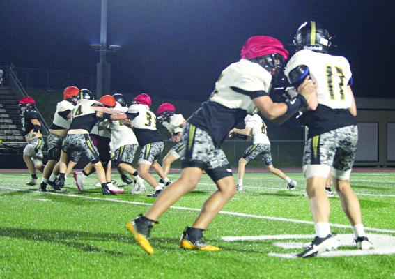 THE TIGERS display their physicality during their recent Black and Gold Scrimmage as part of their preparation for the season. This is Excelsior Springs’ first season under new head varsity football coach Jake Danneman. MIRANDA JAMISON | Staff