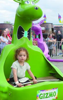 There were rides for everyone, including little Emerson Stratton who enjoyed riding in a dinosour named Gizmo.