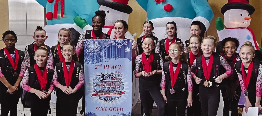 THE NORTHWEST GYMNASTICS Excel Gold Team secures second place overall at the recent Chows Winter Classic competition in Des Moines, Iowa. The team members include Mila Persell (front row, from left), Olive Behler, Summer Lawson, Jacqueline Wood, Mikierah Sunderland, Brooklyn Davis, Addie Effenheim and Brooklyn Braune. Back row: Gabi Hopper, Rylee Pensick, Haisley Taylor, Dalia Hopper, Sarah Howerton, Ellie Evans, Madi Ray and Brooklyn Pahlar. Submitted