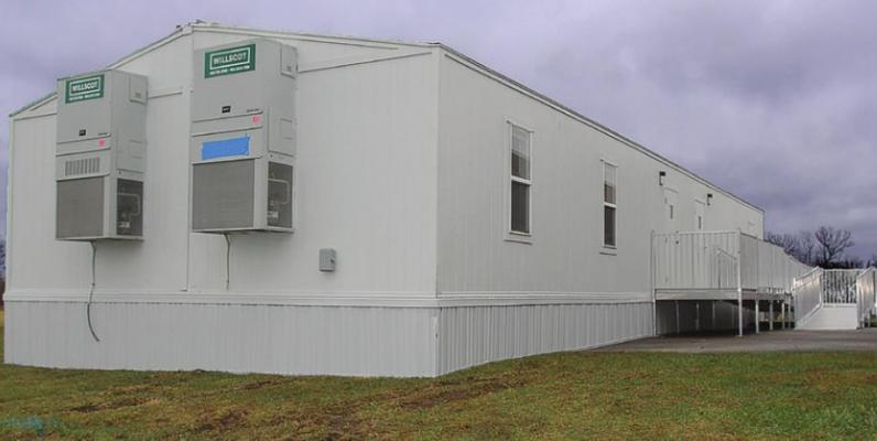 AN OUTBUILDING provides extra space at Elkhorn Elementary School in Ray County. The building that went up late last year will hold students who will be displaced during the construction of new, permanent classrooms.