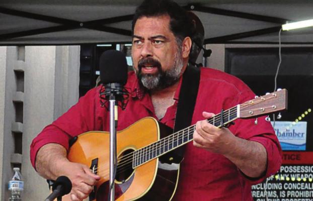 DURING 2021’s Gatsby Day in Excelsior Springs, Greg Blake plays guitar. SHAWN RONEY | Staff