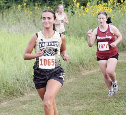 SENIOR JULES MORTON leads the way for the Excelsior Springs girls cross country team. DUSTIN DANNER | Staff