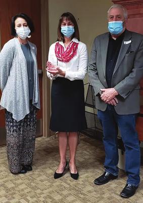 EXCELSIOR SPRINGS Hospital is the chamber Business of the Year. From left are chamber Director Elaina Lamley, hospital CEO Kristen DeHart and chamber President Stephen Stubbs.