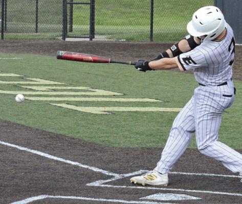 KLAYTON GLASPY takes a big swing during Excelsior Springs’ regular-season finale with Grandview. SHAWN RONEY | Staff