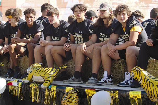 THE EXCELSIOR SPRINGS High School football team takes an easy ride before battling for the homecoming game win.
