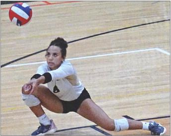 EXCELSIOR SPRINGS senior Reagan Block picks up a dig during the Tigers’ Sept. 21 sweep of visiting Grandview in varsity volleyball action. DUSTIN DANNER | Staff