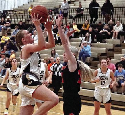 EXCELSIOR SPRINGS sophomore Kinley Rogers goes up for a layup to score two of her team-leading 11 points last week against visiting Oak Grove. TIM HARLAN | Submitted