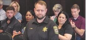 Clay County Sheriff’s Office Deputy Taylor Nave is honored by county commissioners for his response to a serious accident after his quick actions helped control a victim’s potentially fatal bleeding. Submitted