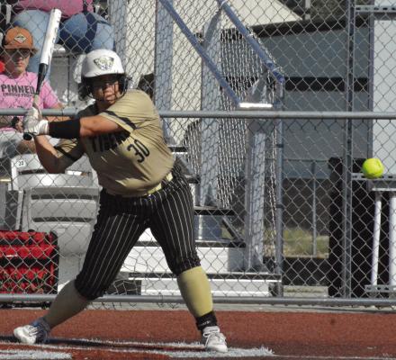 KEIRA ROMAZON, one of seven seniors listed on Excelsior Springs’ varsity softball roster, watches a pitch during the Tigers’ meeting with Lawson in tournament play. SHAWN RONEY | Staff