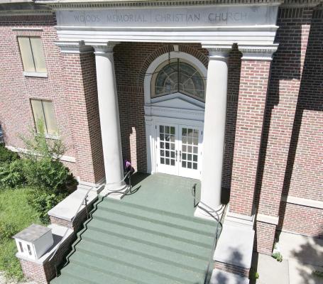 BRIAN RICE | Staff WOODS MEMORIAL CHURCH sits empty on the corner of Concourse Avenue, where it has stood since 1921. Its new owner has plans for a wedding venue and other business ideas.
