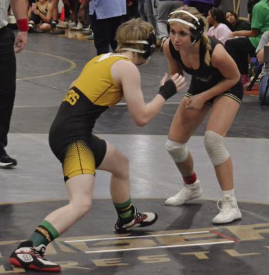 LILLAH SHUE (right) looks to take a shot and score a takedown during the Excelsior Springs Girls Tournament. DUSTIN DANNER | Staff