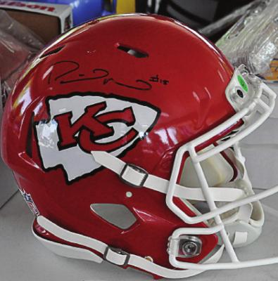THIS HELMET, signed by Kansas City Chiefs quarterback Patrick Mahomes II, fetches $2,600 for the Gregg Williams Foundation. Bidding for the item caps the foundation’s auction July 9 at the Excelsior Springs Golf Course. SHAWN RONEY | Staff