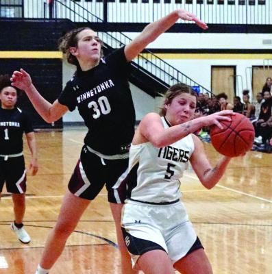EXCELSIOR SPRINGS SENIOR Baylee O’Dell is fouled Jan. 11 as she goes up for two points against visiting Winnetonka. DUSTIN DANNER | Staff