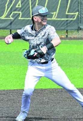 RYNE MARCUM, shown in March 2023 displaying his baseball skills as a shortstop, is focusing on wrestling this week instead, as he and four other student athlletes represent Excelsior Springs at Class 2 state competition. SHAWN RONEY | Staff