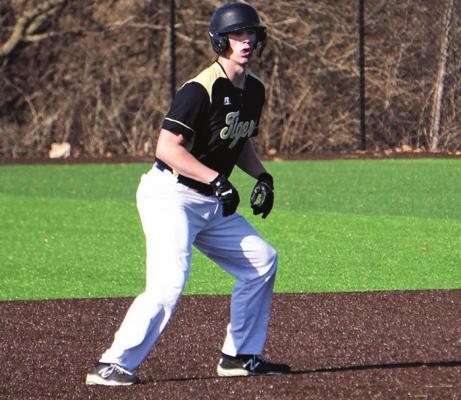 SENIOR KIAN DOLLINS looks in from his lead off of second base March 23 during Excelsior Springs’ 3-2 home win over Belton. DUSTIN DANNER | Staff