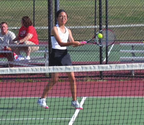 SENIOR KAYLIE COMO executes a backhand shot for Excelsior Springs during a dual Aug. 30 against visiting Odessa as part of an action-packed week. DUSTIN DANNER | Staff