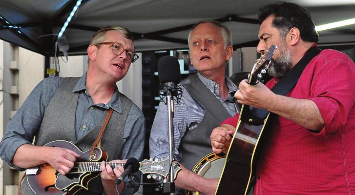 UNITING in harmony, from left, are Brian McCarty; Excelsior Springs native Todd Davis; and Greg Blake. They sing tight as the Greg Blake Hometown Band performs at the Hall of Waters.