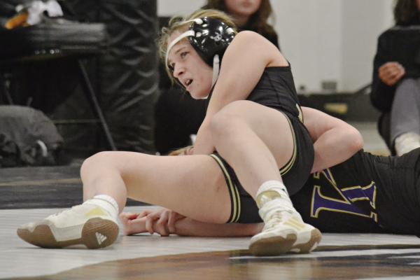KAITLYNN FOSTER stays in control during Excelsior Springs’ varsity girls wrestling dual with Kearney. DUSTIN DANNER | Staff