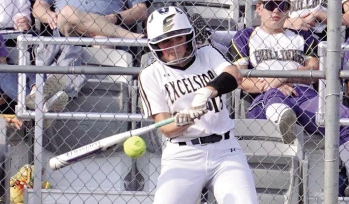 EXCELSIOR SPRINGS junior Chloe Carlyle makes contact last week during a home loss to Kearney. DUSTIN DANNER | Staff