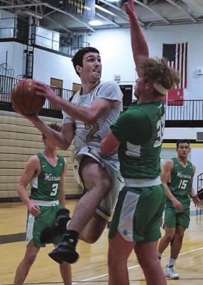 GANNON WILLIS goes up for a shot against Smithville. DUSTIN DANNER | Staff
