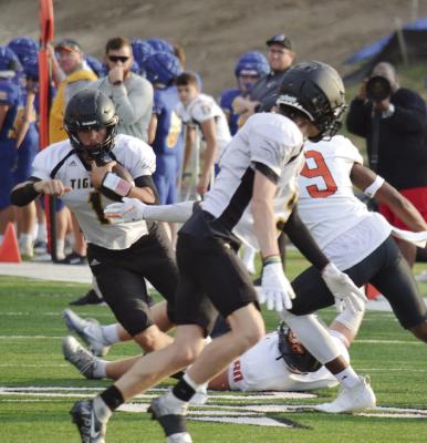 THE TIGERS test their running game Aug. 19 during a preason jamboree hosted by Platte County High School ... DUSTIN DANNER | Staff