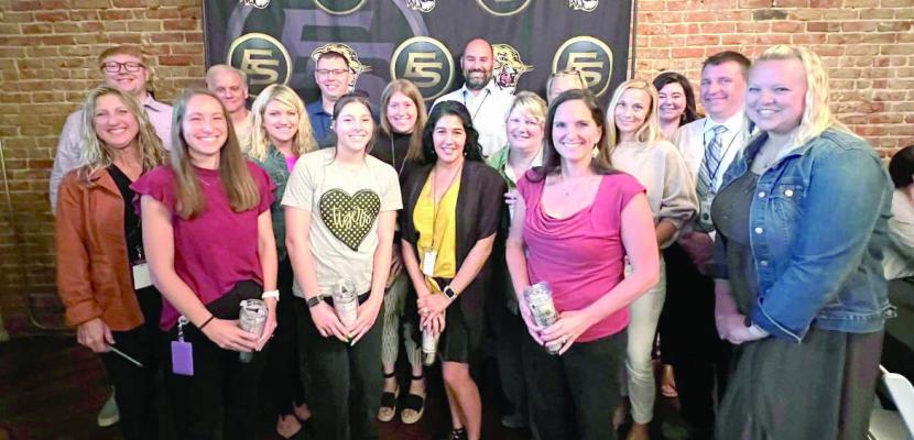 NEW TEACHERS from the Excelsior Springs School District gather for a welcome breakfast get together last week. There are 13 new teachers joining the school district for the 2022-2023 school year.
