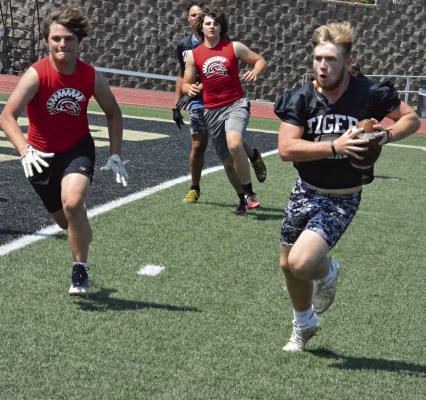 WATCHING CARSON JACKSON clutch the football as he heads for the goal line for Excelsior Springs during a June 7-on-7 scrimmage with Richmond at Tiger Stadium can evoke memories of a past rivalry for certain folks, such as a certain sports editor. SHAWN RONEY | Staff