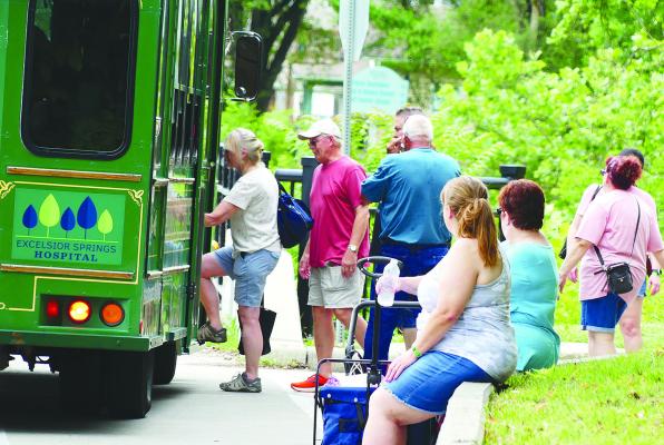 The Excelsior Springs Area Chamber of Commerce trolly service shuttles guests to the wine festival. More photos on page 12. ELIZABETH BARNT | Staff
