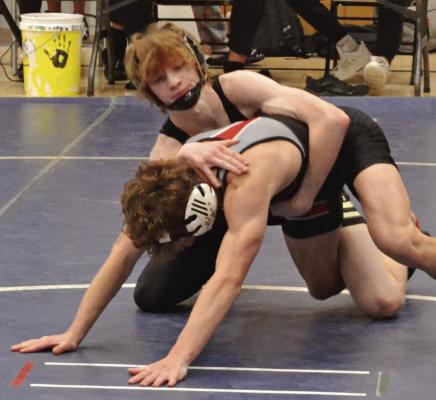 EXCELSIOR SPRINGS sophomore Cooper Collins gains control for a twopoint takedown in pool competition Dec. 15 at the Lee’s Summit Holiday Tournament. DUSTIN DANNER | Staff