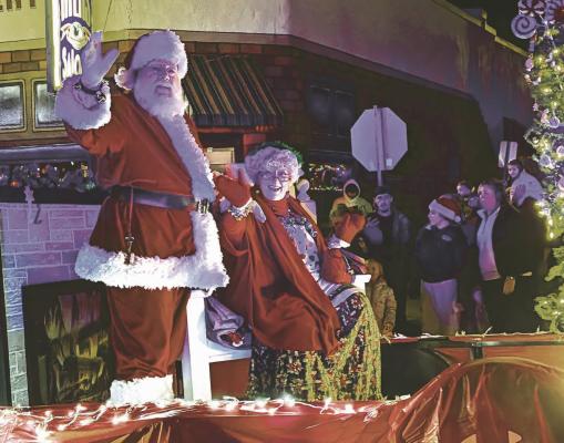 SANTA AND MRS. Claus greet the crowd. MIRANDA JAMISON | Staff
