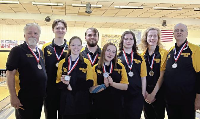ON MAY 6, the Excelsior Springs High School club bowling team will travel to Union for state competition. From left, front row, are Quinlynn Davis and Olivia Smith; back row, coach Sam Stanton, David Falconer, Joshua Oldham, Brody Hurla, Colt Bowman and coach Jerry Ferrell. DUSTIN DANNER | Staff