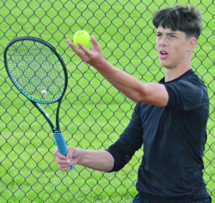 EXCELSIOR SPRINGS sophomore Tyler Wartner prepares to serve during a singles match in the individual portion of the Class 1 District 4 Tournament. SHAWN RONEY | Staff