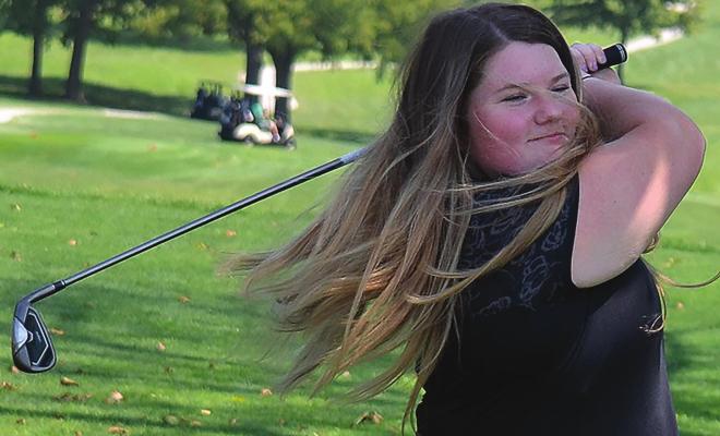 SENIOR HOPE CHAPPEL shows off the follow-through that she hopes will make her a state qualifier again. DUSTIN DANNER | Staff
