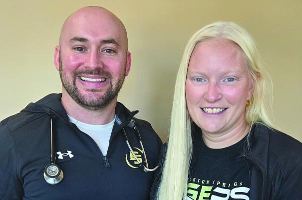 AFTER A PARTNERSHIP with Excelsior Springs School District, Excelsior Springs Hospital Pediatric Dr. Joshua Umscheid and physical trainer Ashley Rose ensure student-athlete safety by being on the sidelines of football games. Submitted