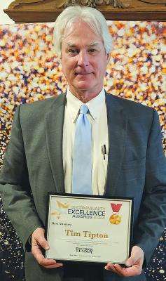 TIM TIPTON ATTENDS the Town and Country Leader’s Community Excellence party to accept his award for Best Lawyer.