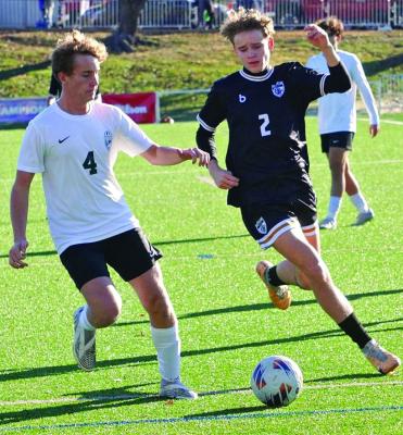 BRADY SCHOONOEVER (No. 2), shown fighting for possession in November 2023 at Class 2 state competition in Fenton, is among those attackers returning from Excelsior Springs’ Class 2 fourth-place boys soccer team TIM HARLAN | Submitted