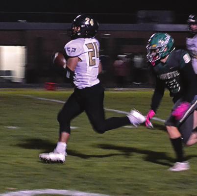 EXCELSIOR SPRINGS senior running back Amani Robinson outruns the St. Joseph Lafayette defense as he helps the Tigers cruise to a Class 4 District 8 Tournament victory Nov. 5 at Alumni Stadium. DUSTIN DANNER | Staff