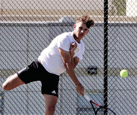 NO. 1 SINGLES player Carter Pitts serves an ace for Excelsior Springs on Senior Night May 1 against Ruskin. DUSTIN DANNER | Staff