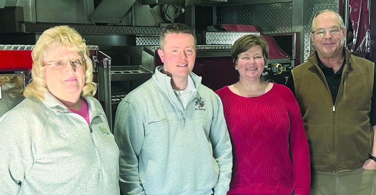 MVP COORDINATOR Tammy Murphy (from left), Excelsior Springs Deputy Fire Chief Camron White, Sarah Davis and Fire Chief Joe Maddick announce a partnership between the fire department and MVP aimed at providing a safety net for seniors. Submitted