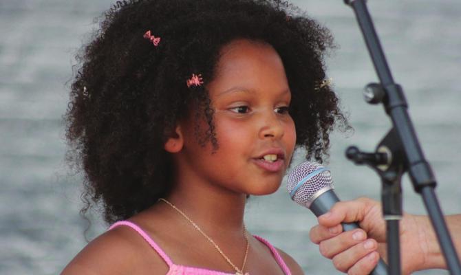 ANNABELLA KIPROP, 9, tells judges, “I want to win to be a part of the community.” SOPHIA BALES | Staff