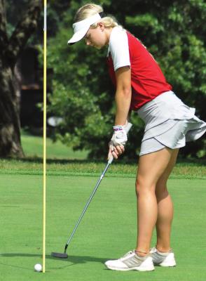 RICHMOND JUNIOR Zalie Gregory taps in a short putt during the Odessa Tournament, which also includes Excelsior Springs, at Shirkey Golf Course. SHAWN RONEY | Staff