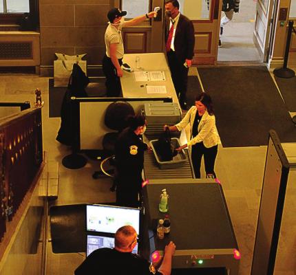 AT THE CAPITOL, concern about COVID-19 leads to visitors being checked for signs of disease, as well as undergoing the usual search for weapons. J.C. VENTIMIGLIA | Staff