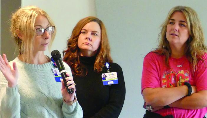 REGISTERED NURSE Case Manager Robin Davidson (from left), licensed practical nurse and utilization review analyst Misty Watson and Clinical Community Education Coordinator Tina Cook discuss swing bed care. ELIZABETH BARNT | Staff