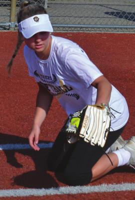 ESHS SENIOR Mallory Millsap works on her backhand fielding skills. DUSTIN DANNER | Staff