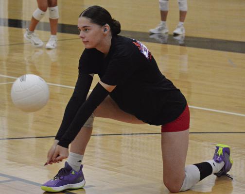 JORDIN PRICE, shown practicing her digs, returns as a middle hitter for the Excelsior Springs varsity volleyball program. SHAWN RONEY | Staff