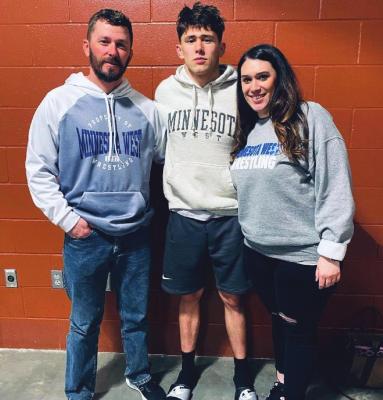 EXCELSIOR SPRINGS graduate Damon Ashworth, flanked by his parents, Jake Ashworth and Jackie Roberts, is an NJCAA All-American at Minnesota West Community and Technical College. SUBMITTED PHOTO