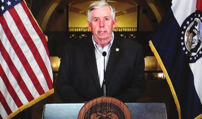 GOV. MIKE PARSON gives a coronavirus update at the Capitol in Jefferson City on March 27.