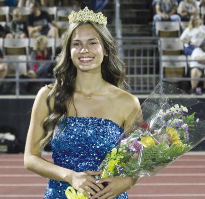 AVA MORTON is crowned homecoming queen during halftime festivities. Other winners of the homecoming court titles include senior king Justin Wright, senior princess Madeline Andreasen, junior prince Jameson Bright and princess Keira Romazon, sophomore prince Landon Cramer and princess Khloe Lee and freshman prince Tyler Wartner and princess Luna Bigham. MIRANDA JAMISON | Staff