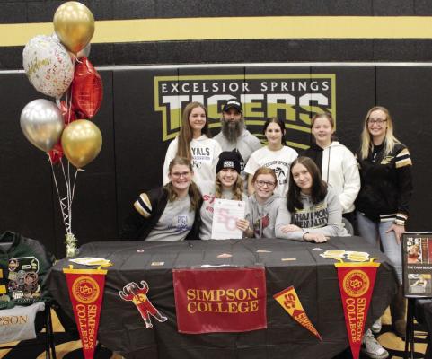 PICTURED FOR Vada Burton’s signing ceremony are, front row, Adrian Crawley, Burton, Paige Barber, Bailee Baxter; back row, Gabby Scrivener, coach Scott Schwab, Justus Sutton, Lilly Wilson, Alyssa Betts. Submitted